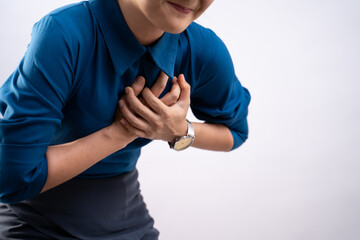 Fototapeta premium Asian woman was sick with chest pain standing isolated on background.