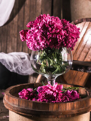 bouquet of peonies in a glass