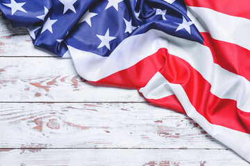 USA flag on light wooden background