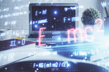 Desktop computer background and formula hologram writing. Double exposure. Education concept.