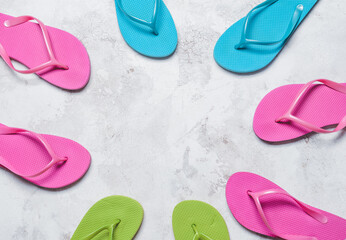 Stylish flip-flops on light background