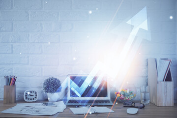 Computer on desktop with point up arrows hologram. Double exposure. Concept of success.