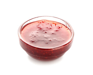 Bowl of tasty strawberry jam on white background