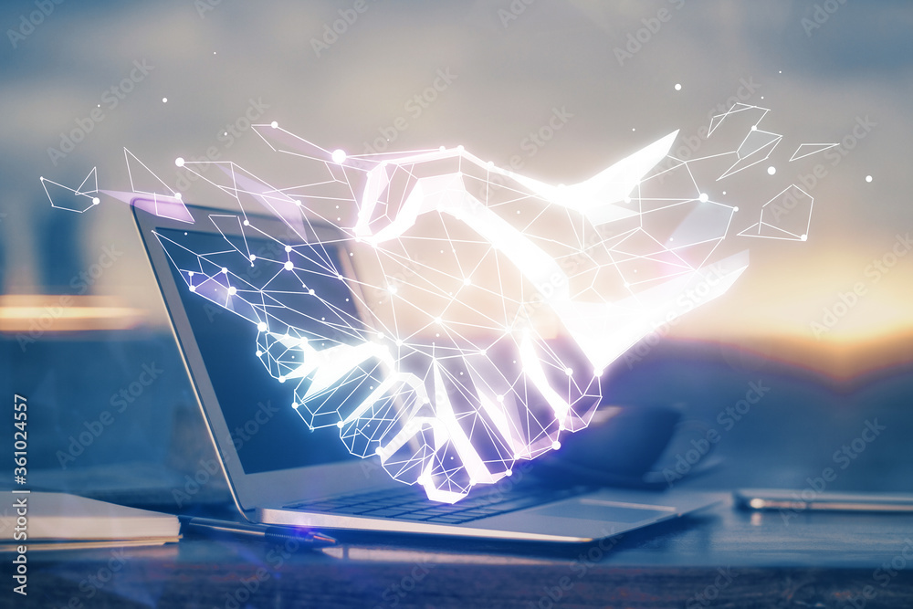 Poster desktop computer background in office and handshake hologram drawing. double exposure. pertnership c