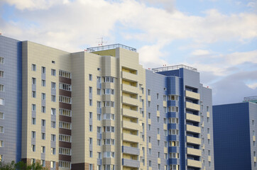 Multi-storey, residential new home on a sunny day.