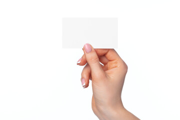 Obraz premium Beautiful female hand holding white business card on white background