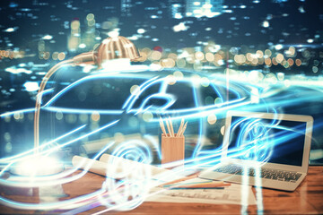 Desktop computer background in office with automobile hologram drawing. Multi exposure. Tech concept.