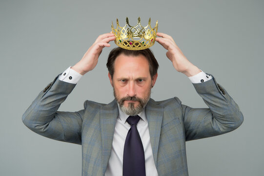 Kill your pride before you lose your head. Big boss wear crown with pride. Proud businessman grey background. Bearded man in formalwear. Pride and egoism. Pride and ambitions. Toxic ego