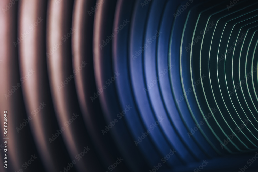 Poster Beautiful abstract gray tunnel with color light on a background.