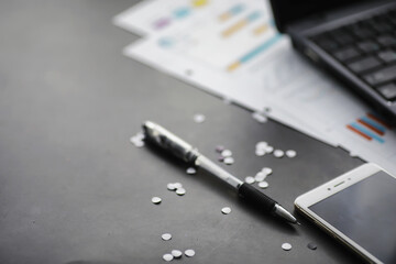 Working time symbolizes the desktop. Office desk with papers from an insurance manager and banker. Office worker at the table. The concept of lack of time.
