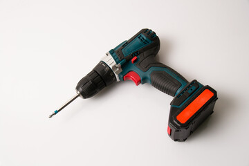 Screwdriver on a gray background. Concept advertising construction companies