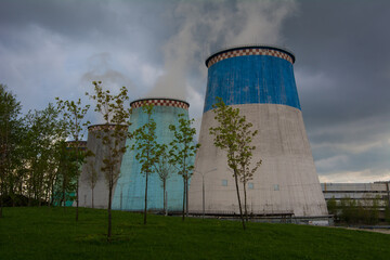 Cooling towers of a thermal power plant on a sunny summer day.