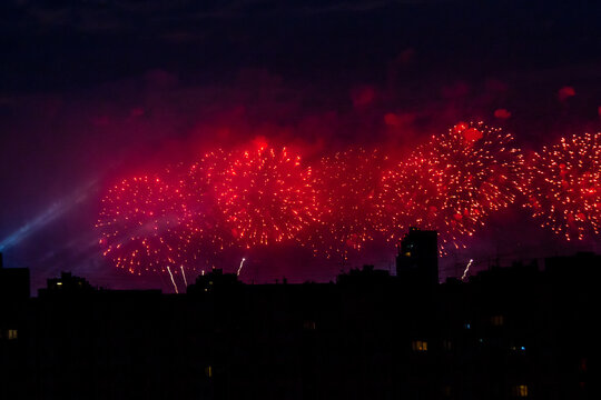 red fireworks in the sky above Saint Petersburg