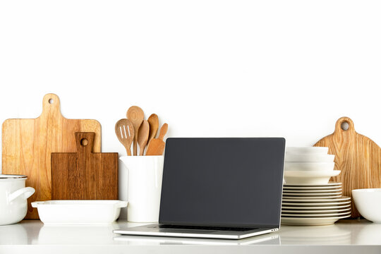 Contemporary Kitchen background with culinary utensils, front view