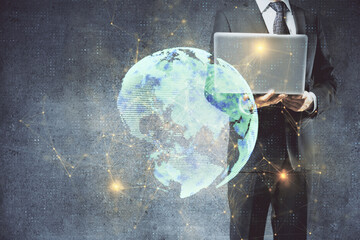 Media network theme hologram with man working on computer on background. Concept of internet...