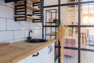 luxury modern design of a cozy small Scandinavian-style studio apartment with white walls, second...