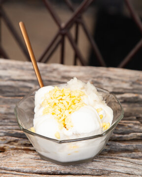 Coconut milk ice cream cup with spoon