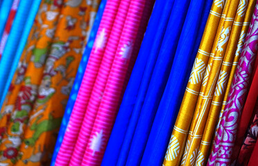 Close-up of Indian woman sarees or saris in display of retail shop