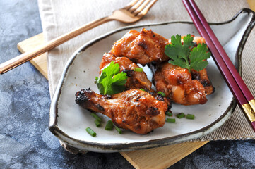 Grilled Chicken Drumsticks in Asian Style ready for Lunch