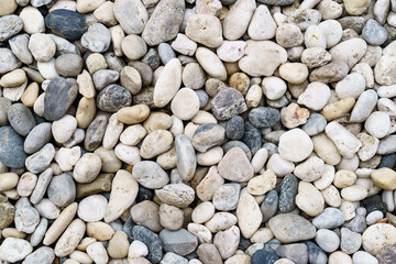Multi color pebbles stone texture background.