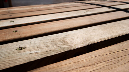 Detail of wooden bench. Wooden bench.