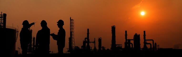 Silhouette Engineer working in Petrochemical industry area.