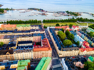 Aerial sunset view of beautiful city Helsinki . Colorful sky and colorful buildings. Helsinki,...