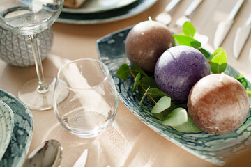 Luxury green table setting decorated with candles