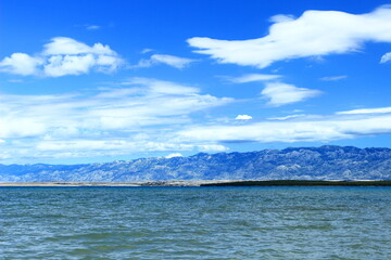 Nice clouds above Velebit mountain in Croatia, view from seaside 