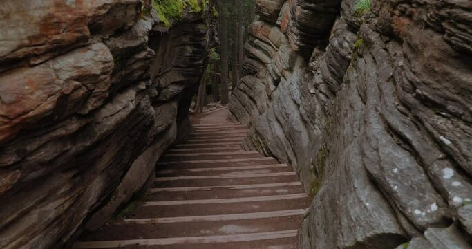 Beautiful staircase carved in the middle of a rock cravas at the Athabasca Falls lookout in Jasper National Park, Alberta, Canada.