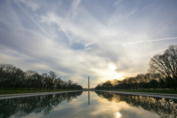 Beautiful landscape. Lincoln Monument against a beautiful sunset sky reflected in the Mirror Pond...