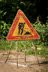 Work in Progress - Triangular Road Sign on the Roadside