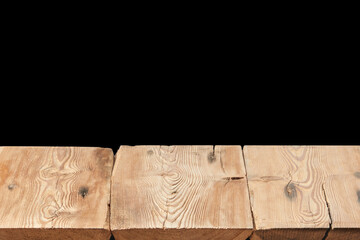 Wooden table on a black background can used for display or montage your products.