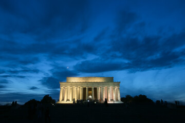 Illuminated Lincoln Memorial in Washington DC against a beautiful sunset sky