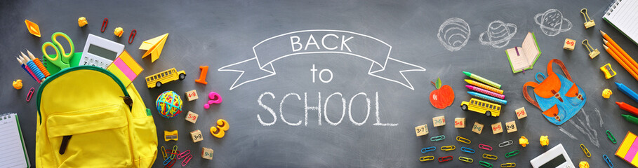 Obraz premium education. Back to school concept over blackboard background. top view, flat lay