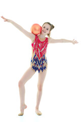 Girl gymnast performs exercises with the ball.