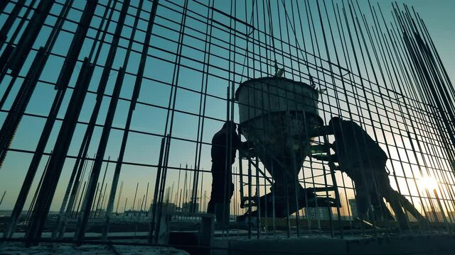 Cement cistern is getting handled by construction experts