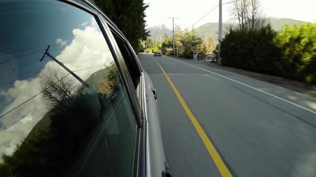 Girl Hanging Her Head Out A Car Window