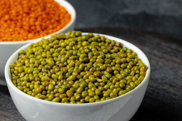 Bowl of green lentils on kitchen table