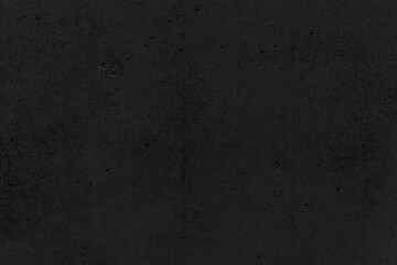 black concrete stone texture for background in black.  Cement and sand grey dark detail covering.
