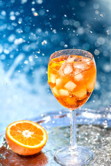 Summer alcoholic refreshing cocktail - Aperol spritz. Popular italian drink