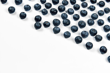 nature and healthy food concept - Top view of fresh blueberries isolated on white background. Copy space.