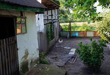 Farmers sheds and a lonely chicken in the yard