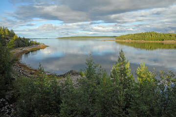 Fototapeta na wymiar Karelian landscape. View of Kandalaksha Gulf of White Sea from Sredny island. Keret archipelago, Republic of Karelia, Russia.