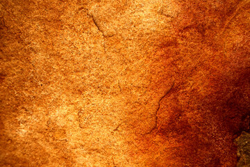 ancient red yellow granite stone surface of cave for interior