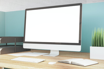 Contemporary designer desktop with empty white computer screen