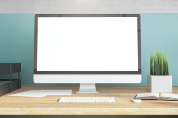 Side view designer desktop with empty white computer screen