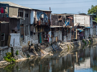 The slums of Jakarta are the capital of Indonesia.