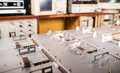 Metal boards and accessories lie on the surface