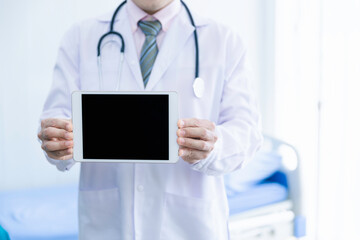 Doctor hold digital tablet with blank screen in hospital